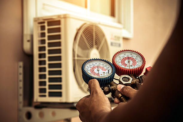 Professional Heat Pump Repair technician working in North Lewisburg, OH